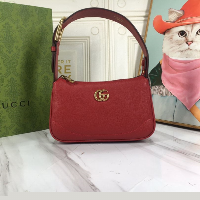G*u*i top handle bags